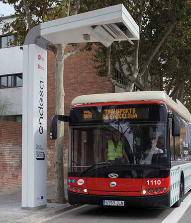 Electric bus at charging station in Barcelona