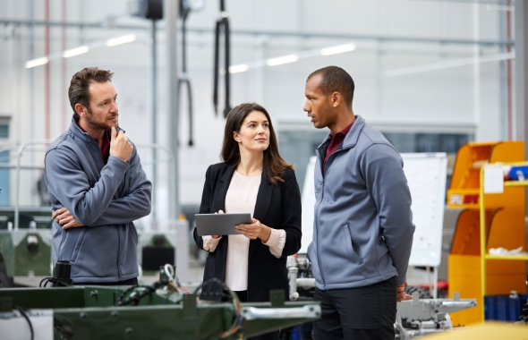 professionals discussing in an industrial business