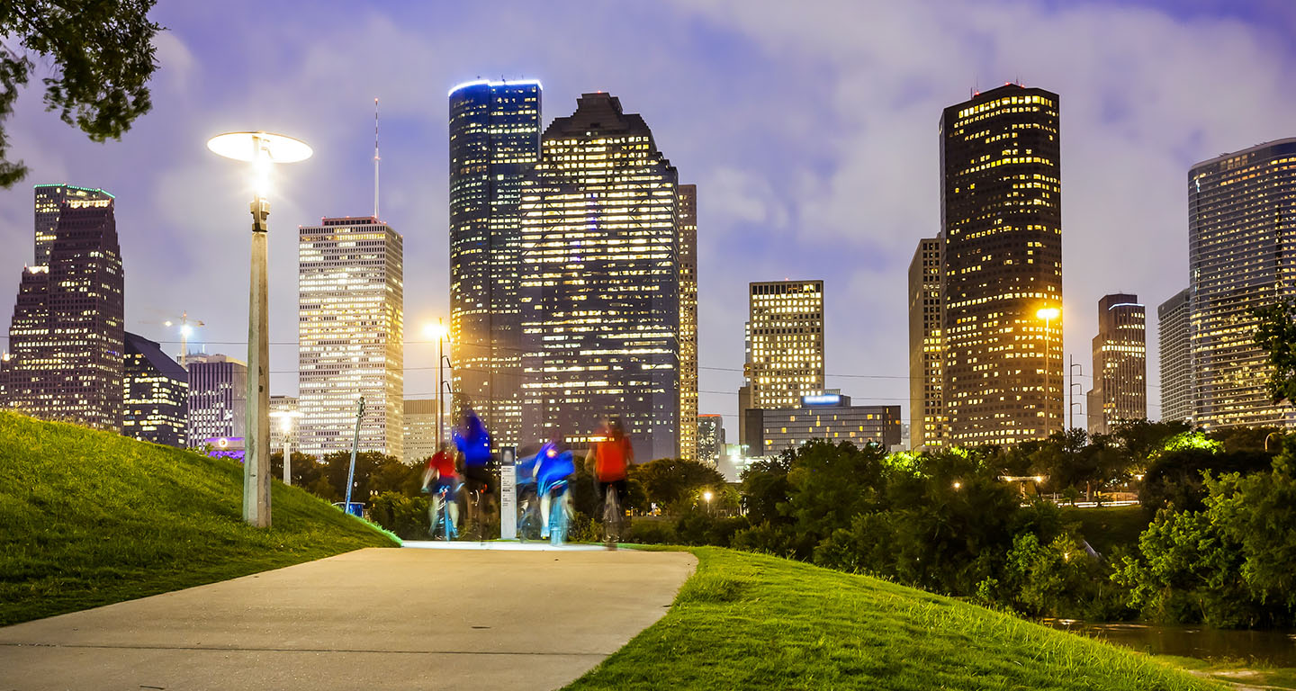 Houston skyline and people enjoying the park