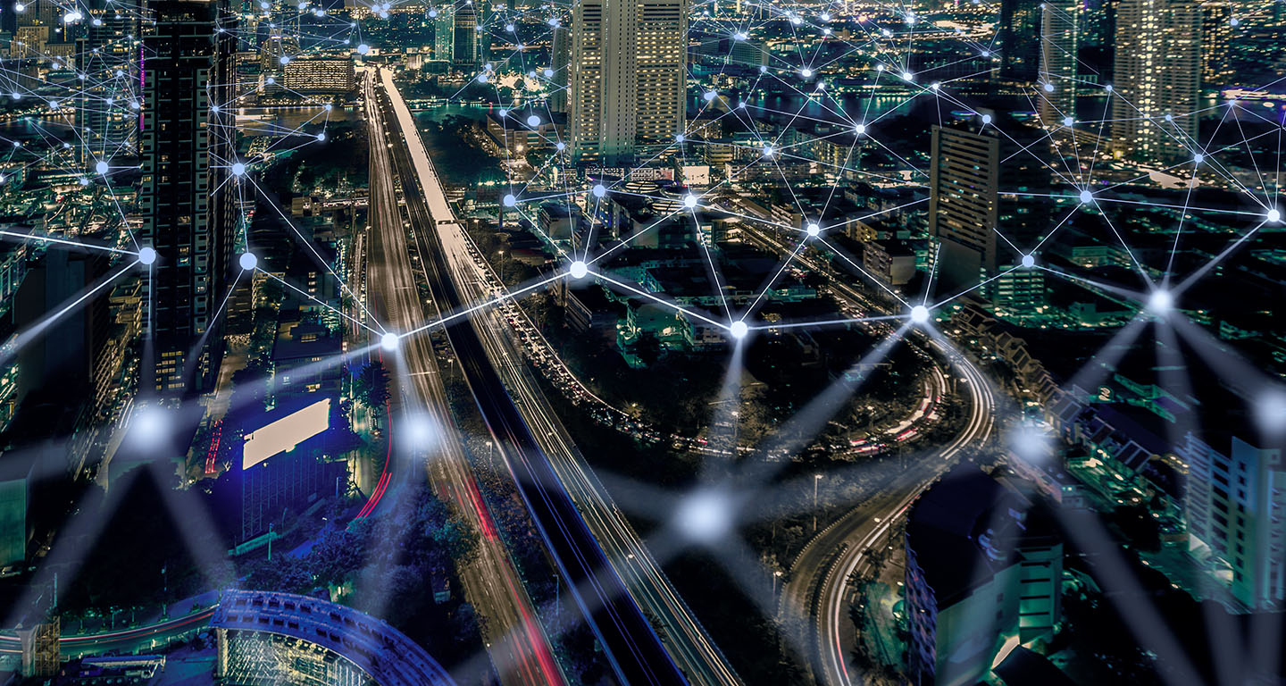 aerial shot of city with connected grid overlay