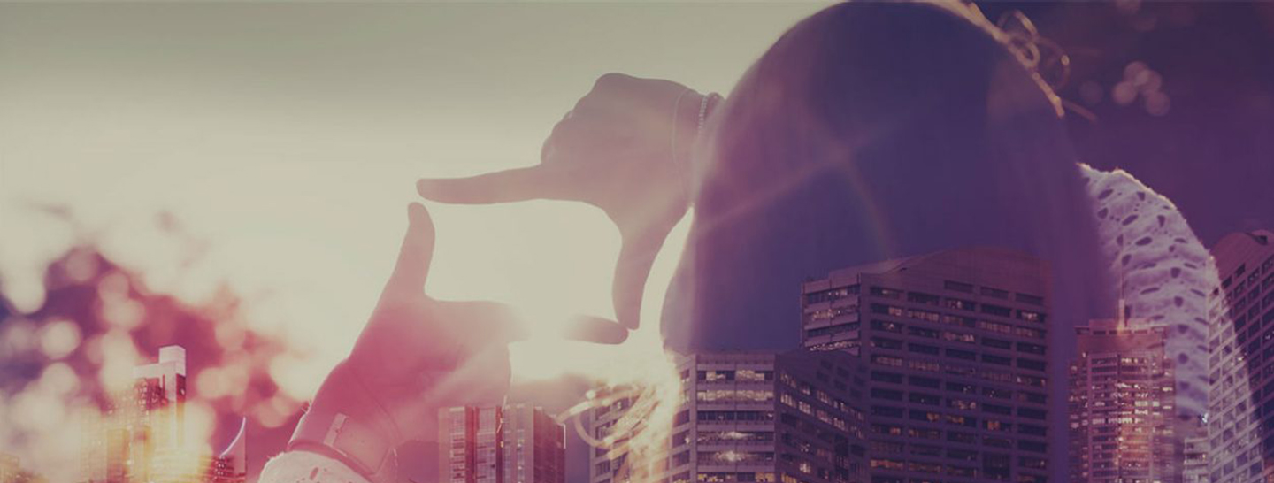 Woman framing view of city