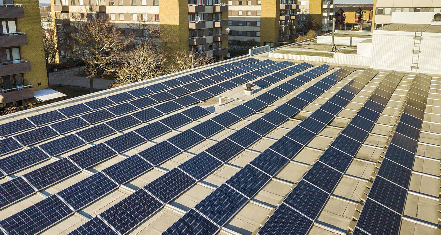 solar panels on rooftop of large building