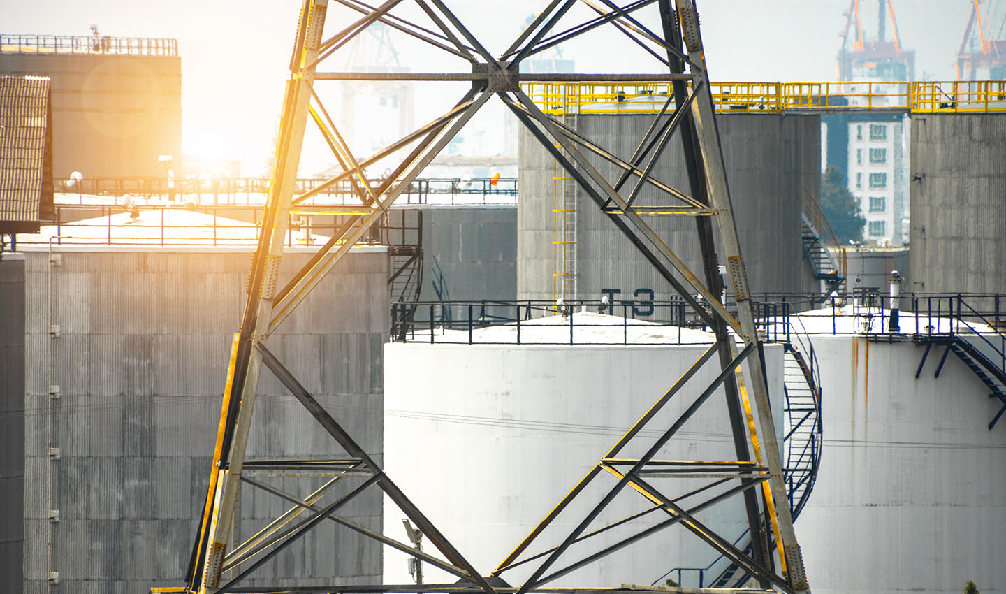 high-voltage tower in industrial area