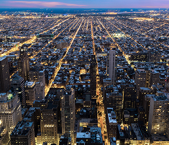 aerial of city grid at night